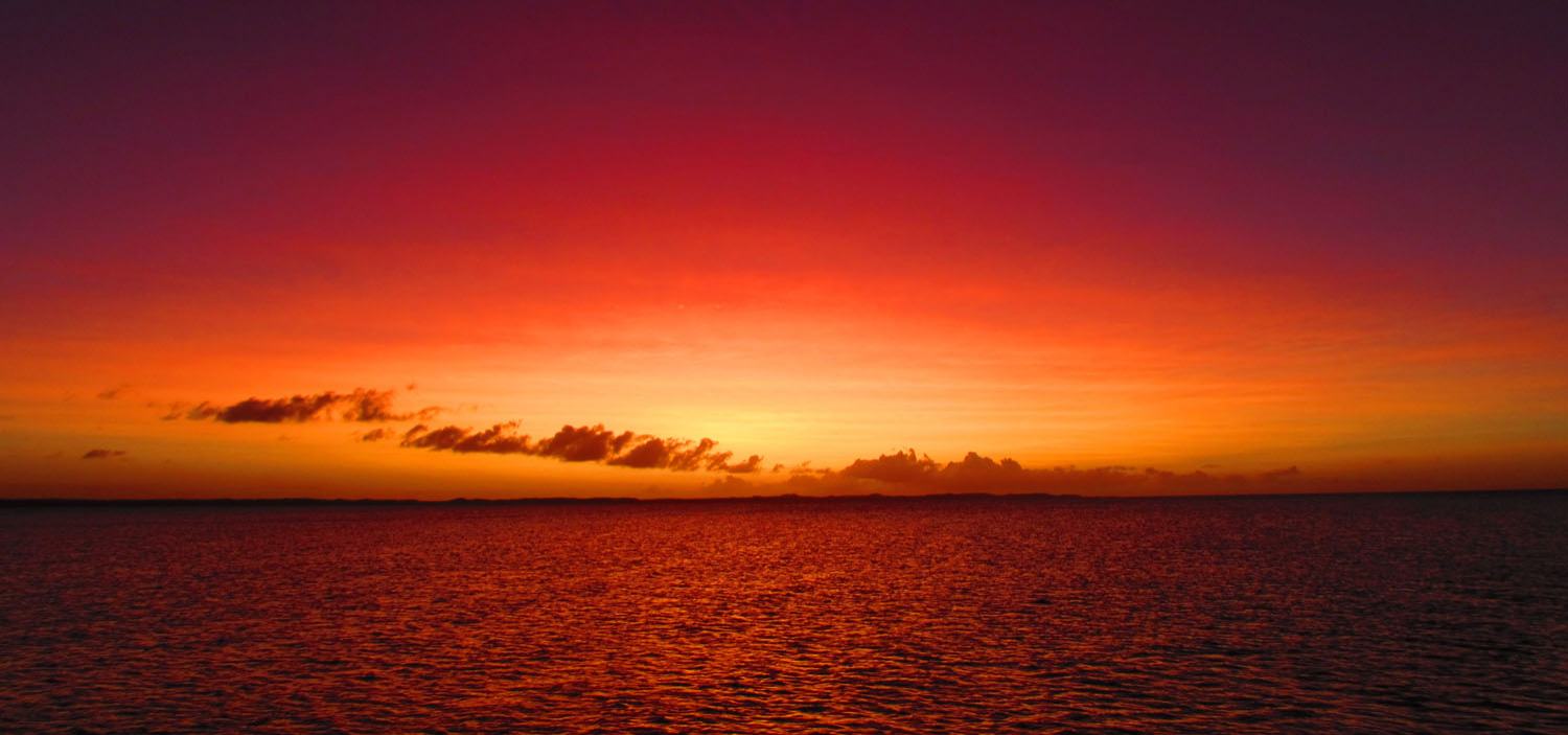 Experience the most vibrant pink and orange sunsets on a South East Asia yacht charter